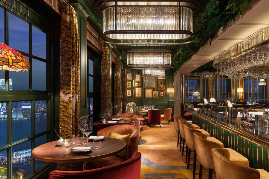 The interior of The Aubrey at Mandarin Oriental Hong Kong features sleek and stylish décor in deep earthy tones.