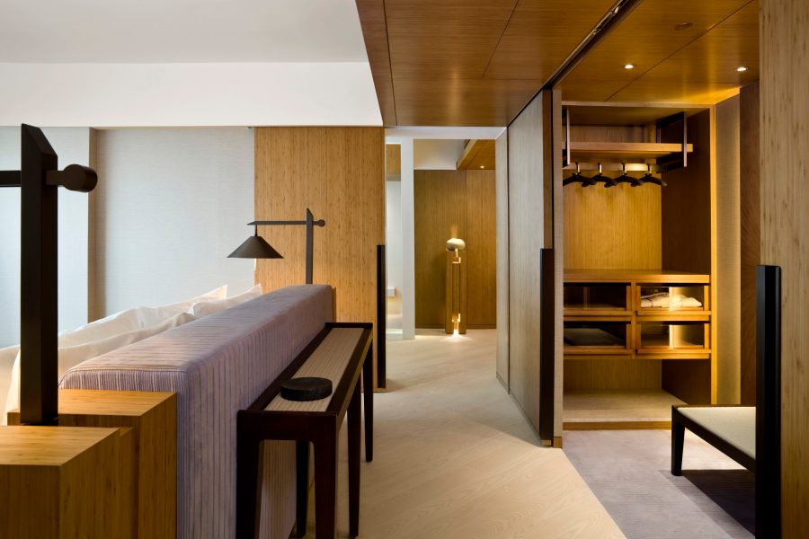 A guest room at The Upper House features minimalist design focused on wooden textures.