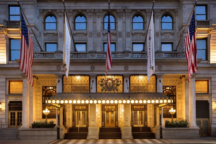 Exterior view of The Plaza and flags hanging outside it in New York City