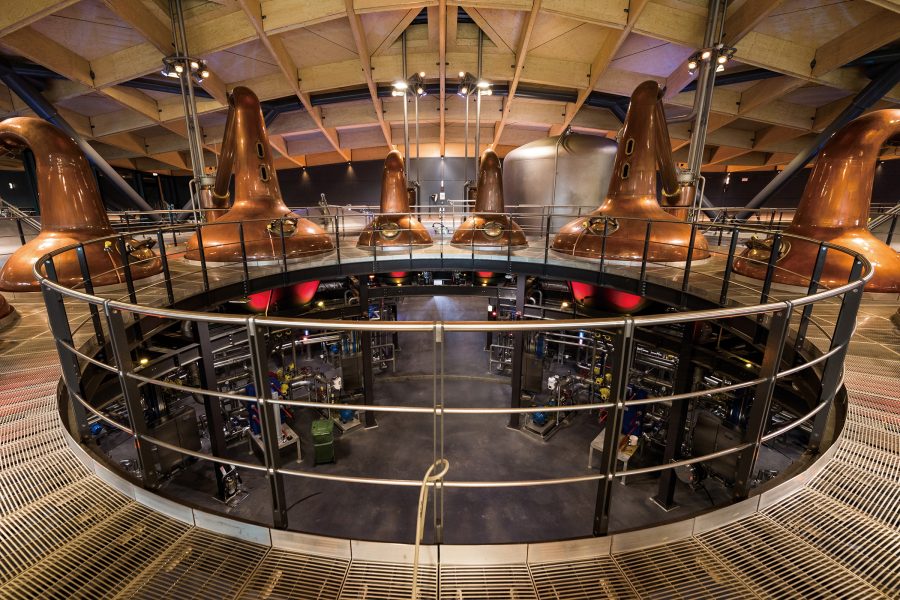 Interior view of whisky stills and a downstairs area at The Macallan distillery