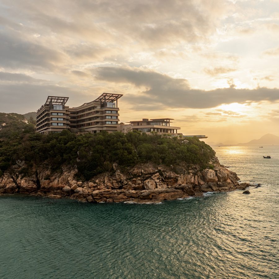 Alila Dong’Ao Island Zhuhai stands atop Dong’Ao Island as the sun sets in the background. 