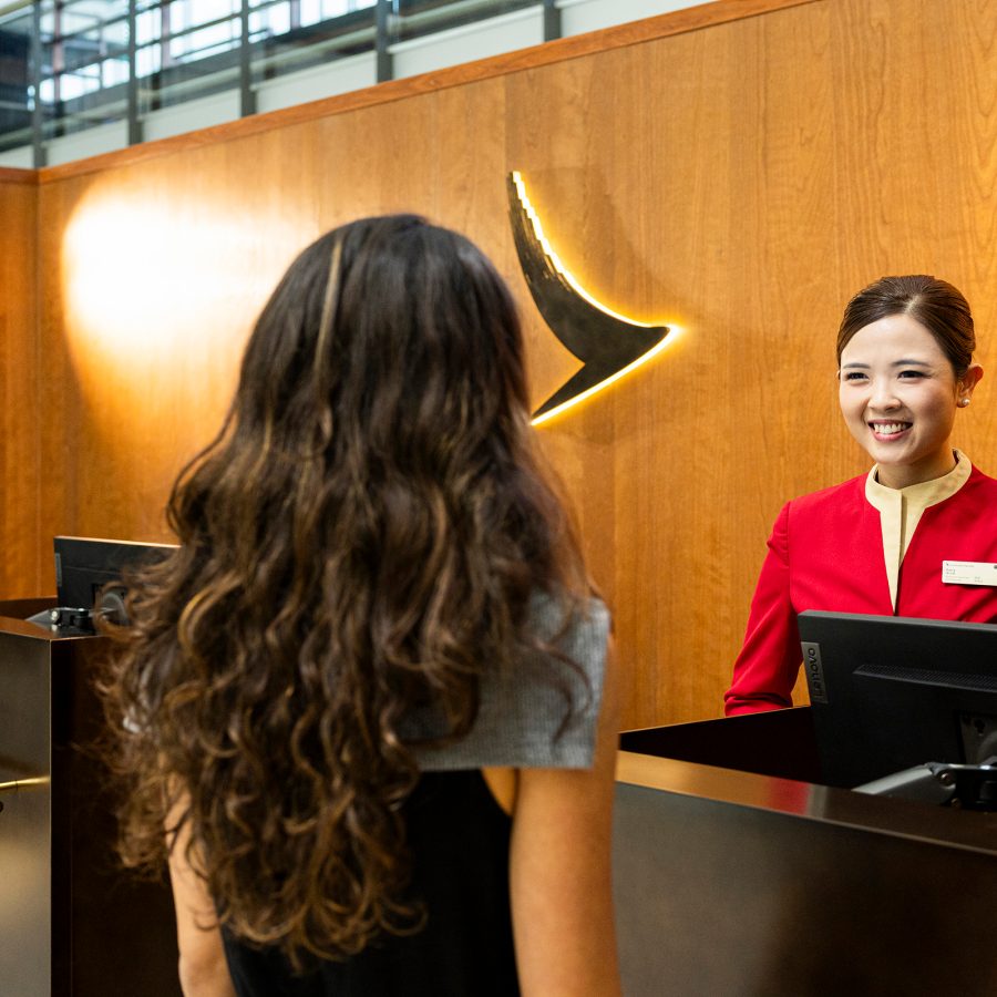 A customer facing the biometric check-in point at The Bridge. 