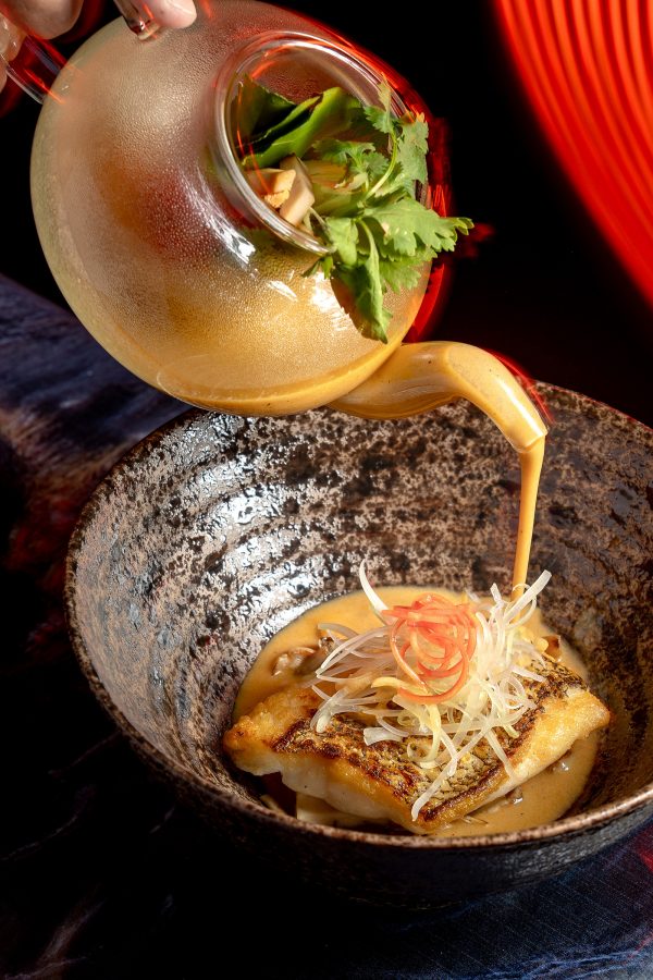 Galangal soup fish with grilled mushroom served at Sood by Chef Ton, George Town. 