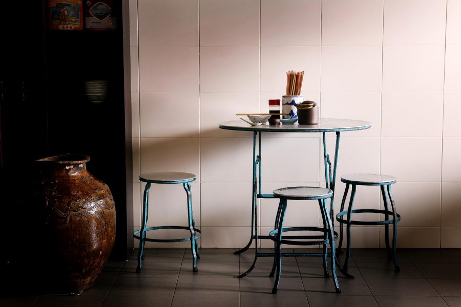 A table and three chairs at Teksen, George Town.