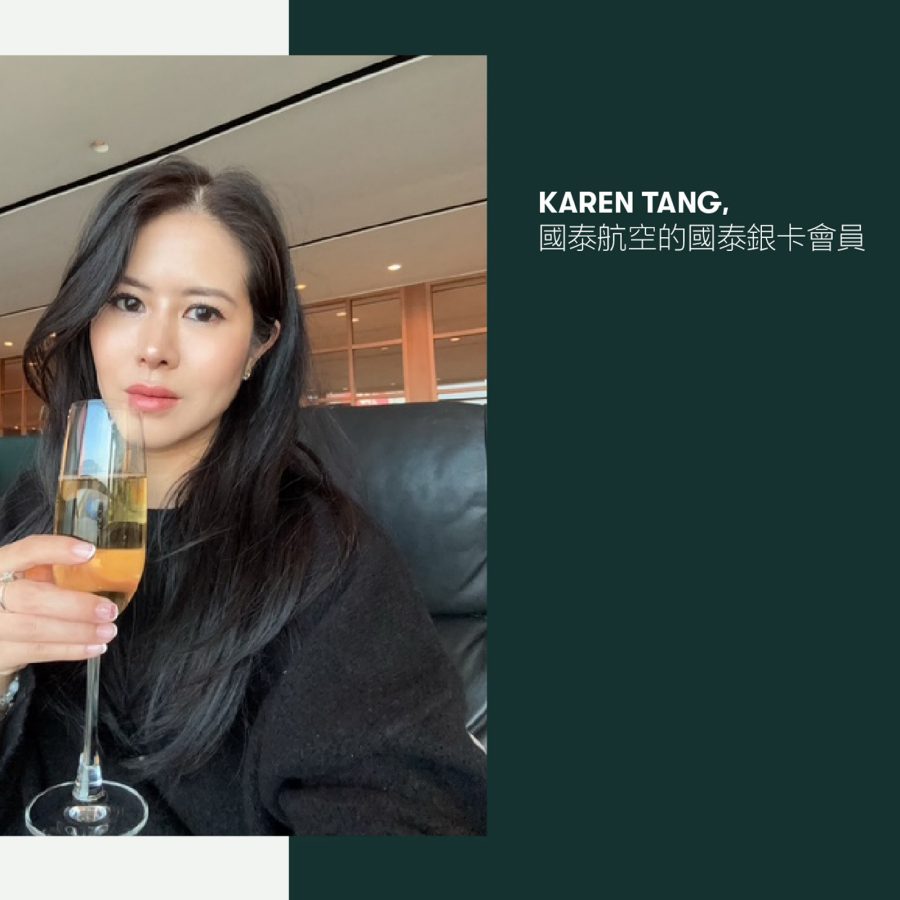 Cathay Pacific's Cathay Silver Member Karen Tang holding a glass of champagne in the Cathay Pacific lounge