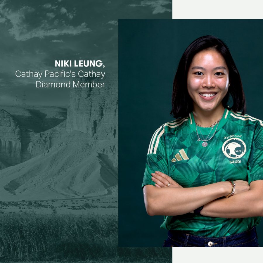 Cathay Pacific's Cathay Diamond Member Niki Leung wearing a football shirt with her arms crossed