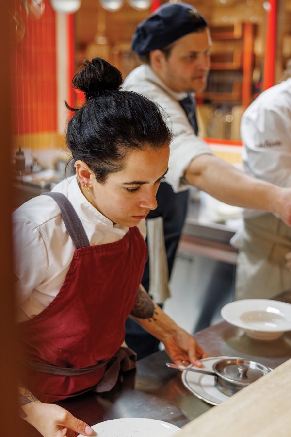 Chefs work in the kitchen at SantoPalato