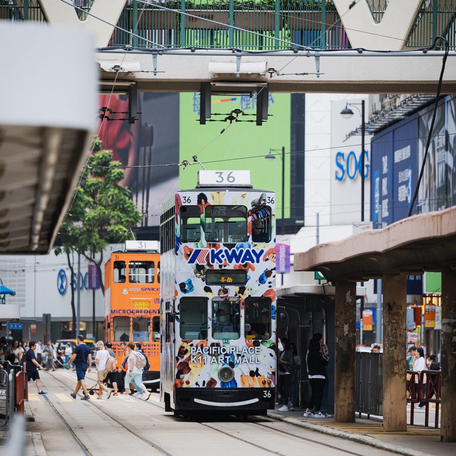Trams make their way down the rails in Causeway Bay, Hong Kong.  