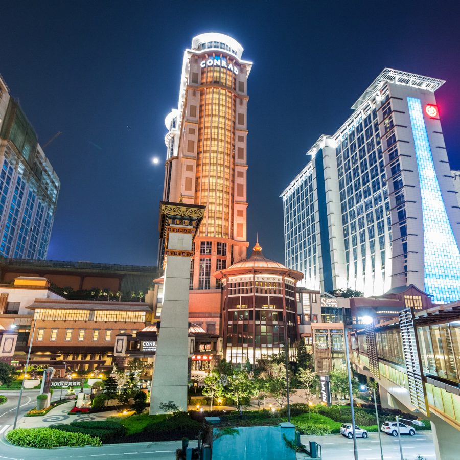 Resorts and casinos light up at night in Macao.