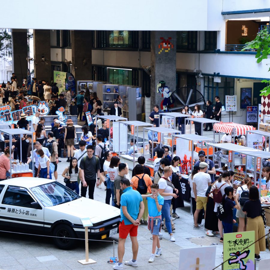 People browse wares at PMQ’s outdoor stalls.