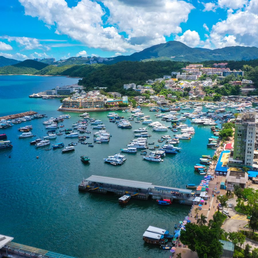 Boats occupy the water just off of Sai Kung’s pier. 