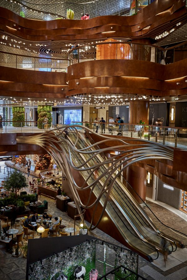 The interior of K11 Musea is spacious and features a sculpture between two storeys. 