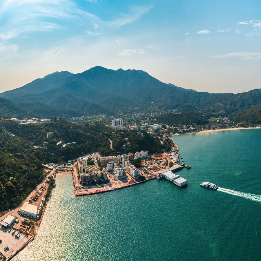 From above, Mui Wo is a small town sandwiched between the rolling hills and the sea.