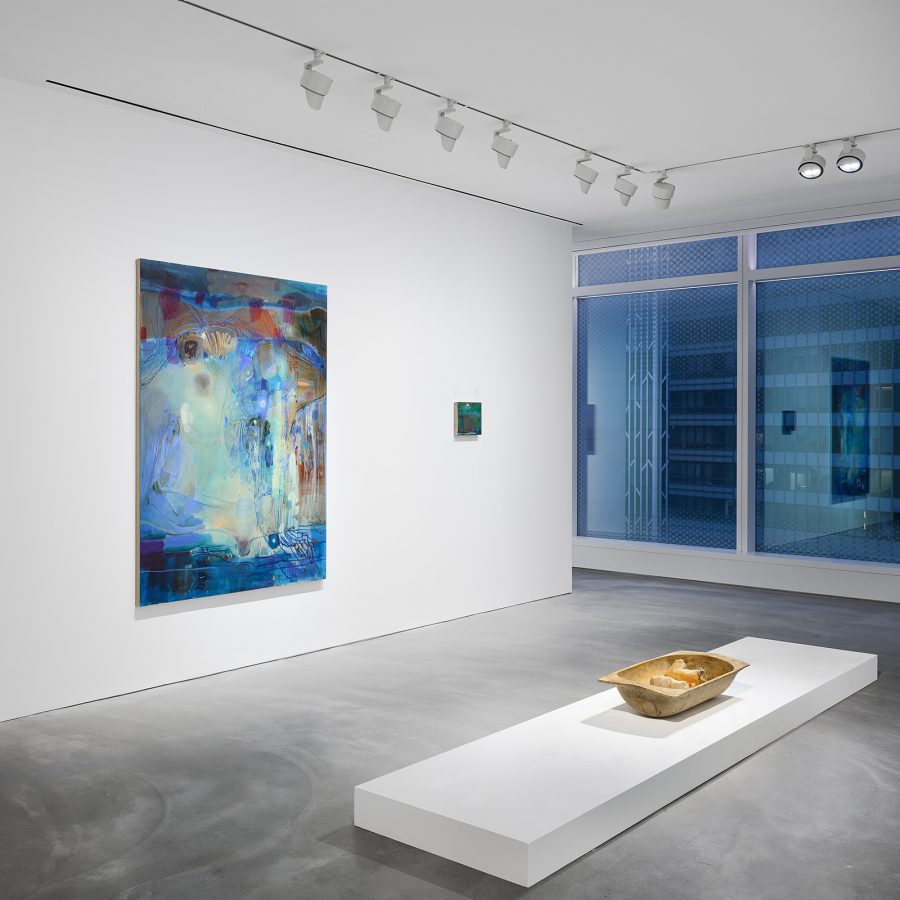 A gallery inside H Queens showcases various pieces of art.  