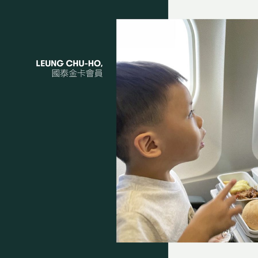 A young boy with food on a plane.