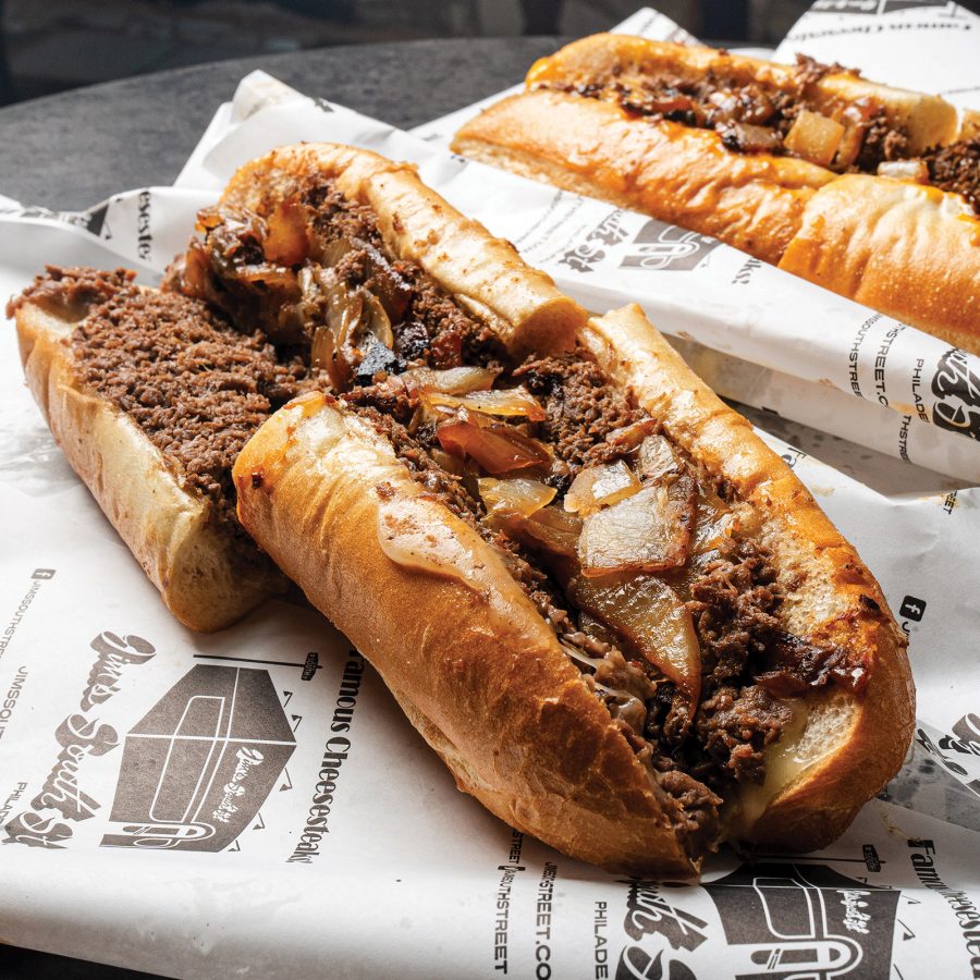 A close-up image of a Philadelphia cheesesteak on a table at Jim’s South Street restaurant.