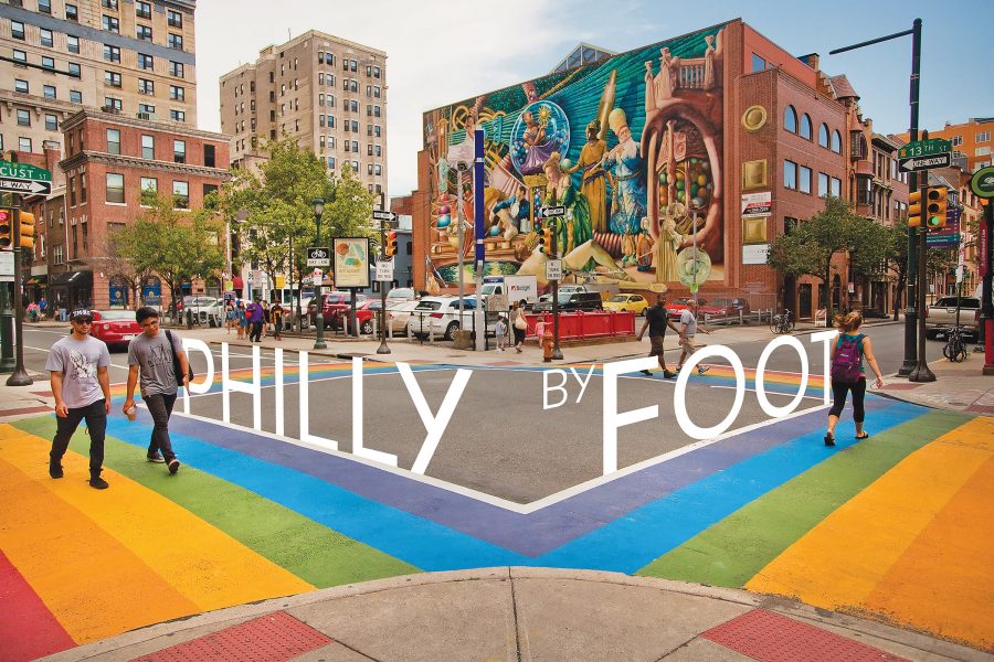 Exterior view of people at the famous rainbow crossing in Philadelphia’s Midtown Village.