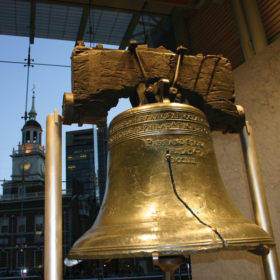 The famous Liberty Bell with buildings in the background