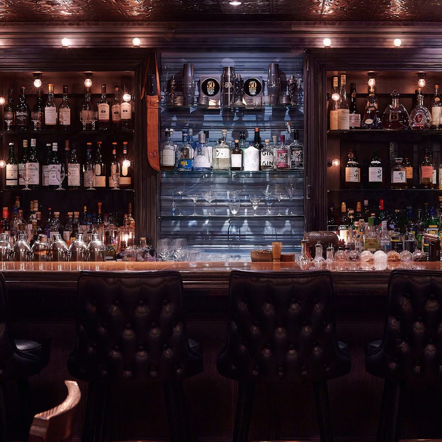 Interior view of the dimly lit bar at Speak Low, Shanghai.