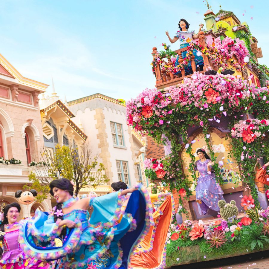 Disney princes and princesses parade past on floats at Hong Kong Disneyland.