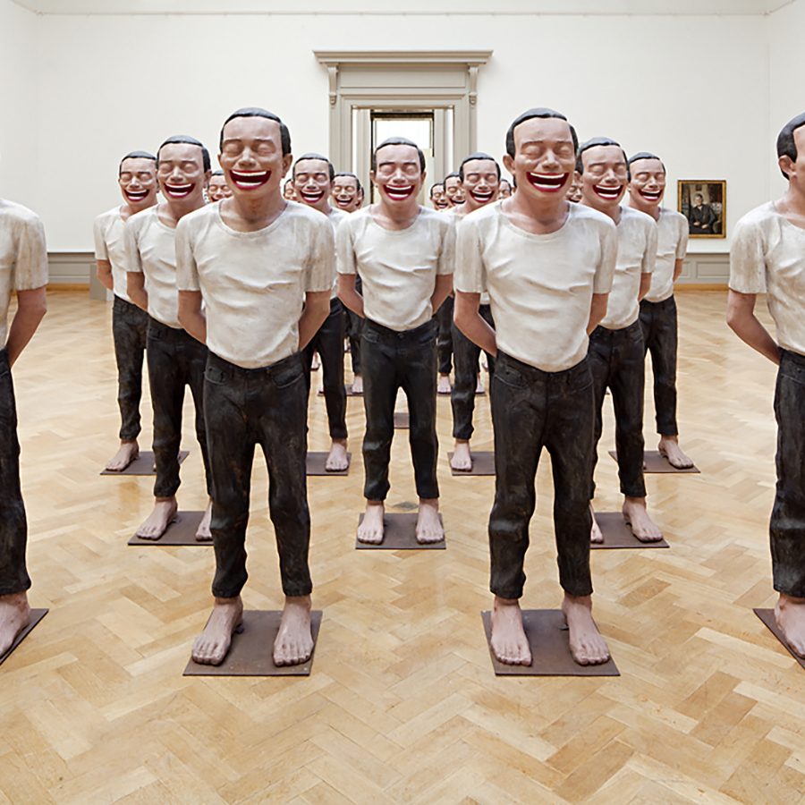Artist Yue Minjun sculptures on display at M+ in Hong Kong.