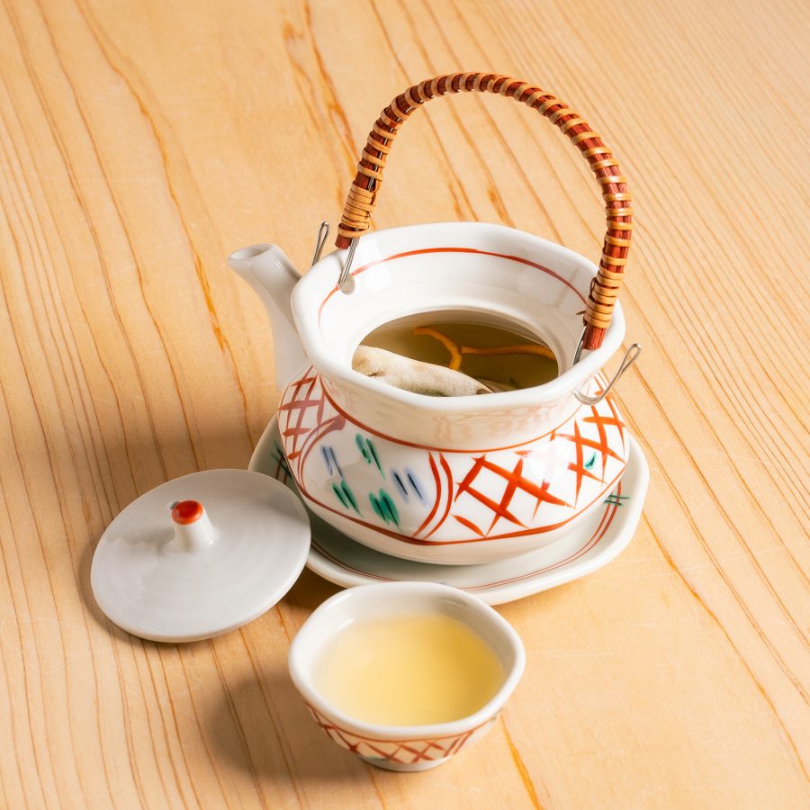 A close up of a tea pot and cup served at Niwa Sushi 