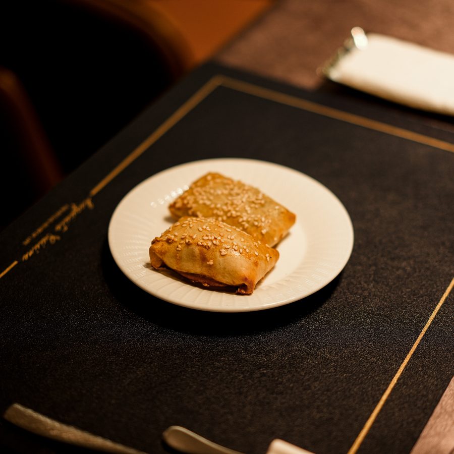 Food is served on a plate at Nadear.   