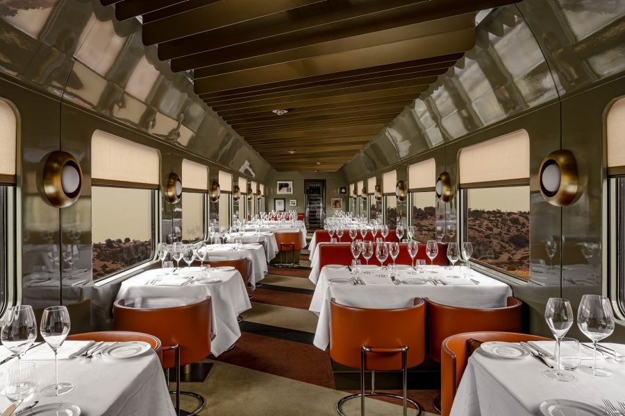 Interior view of the dining car on the La Dolce Vita Orient Express train.