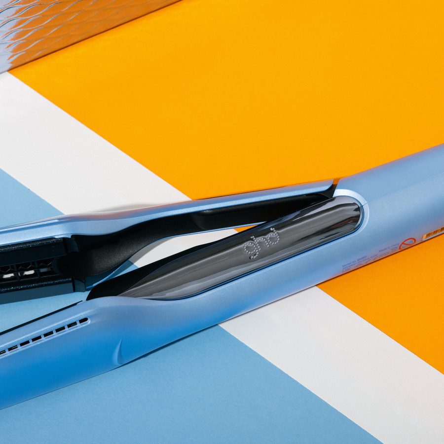 The Ghd Iced Luxe Duet Style on blue and orange sports flooring. 