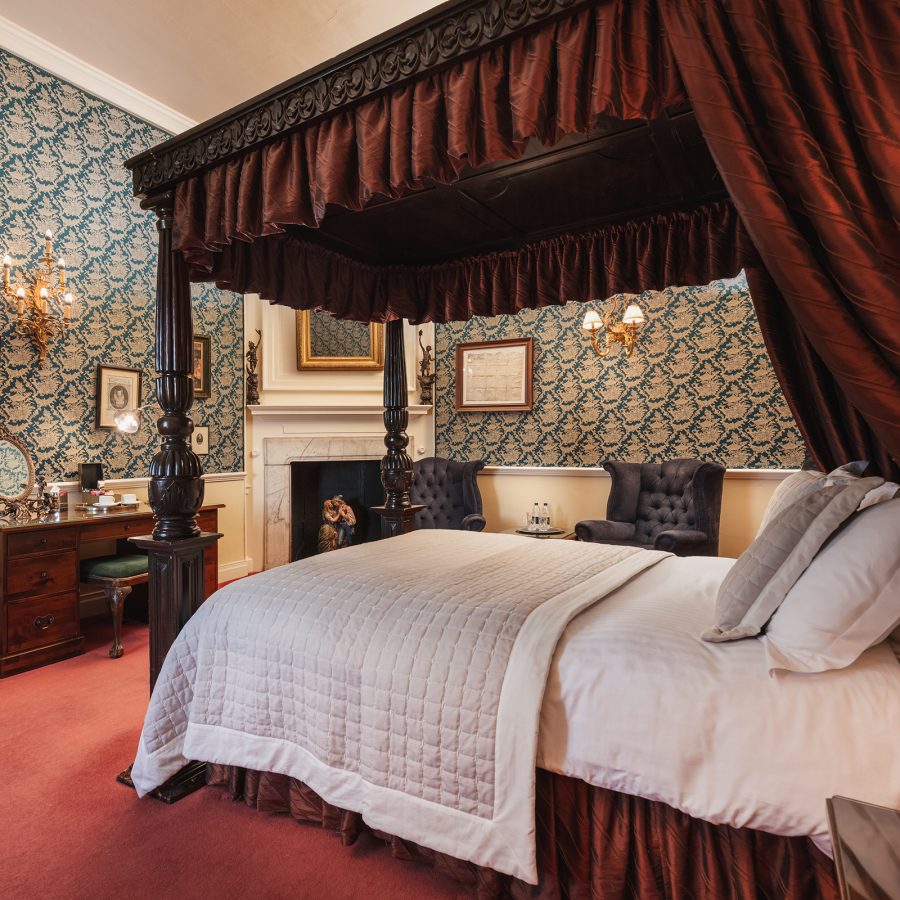 Interiors of a hotel room with a four poster bed in Sunderland.  
