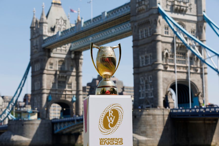 A trophy sits on top of a box reading Women’s Eng 25 in front of Tower Bridge in London.     
