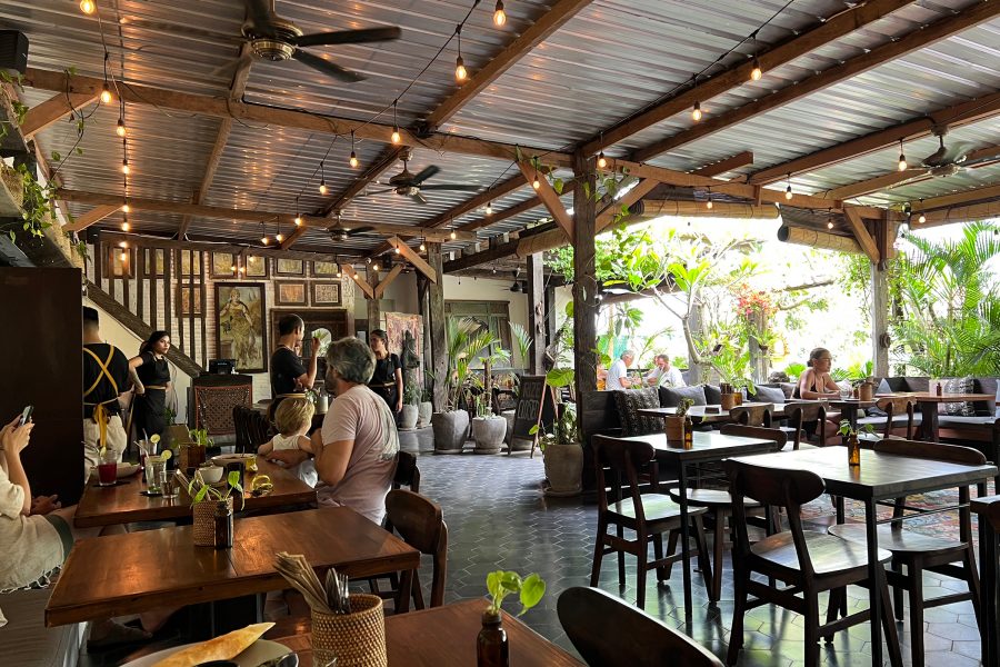 The interior of Rize is full of wooden furniture with a homey vibe. 