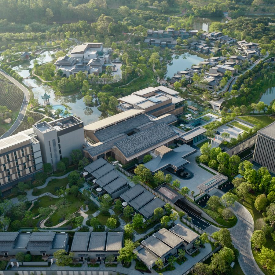  MGM Reserve Zhuhai from above is a sprawl of buildings set in a lush green forest. 