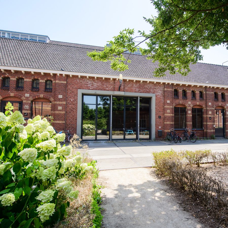 A streetview of Zuiveringshal West historic building shopping complex in Amsterdam, Netherlands 