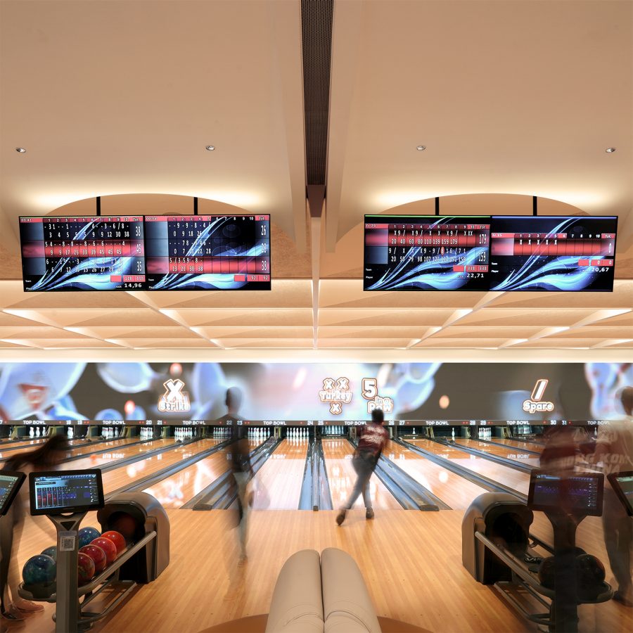 Interior nighttime view of Top Bowl, a 40-lane venue that forms part of the new Kai Tak Sports Park.