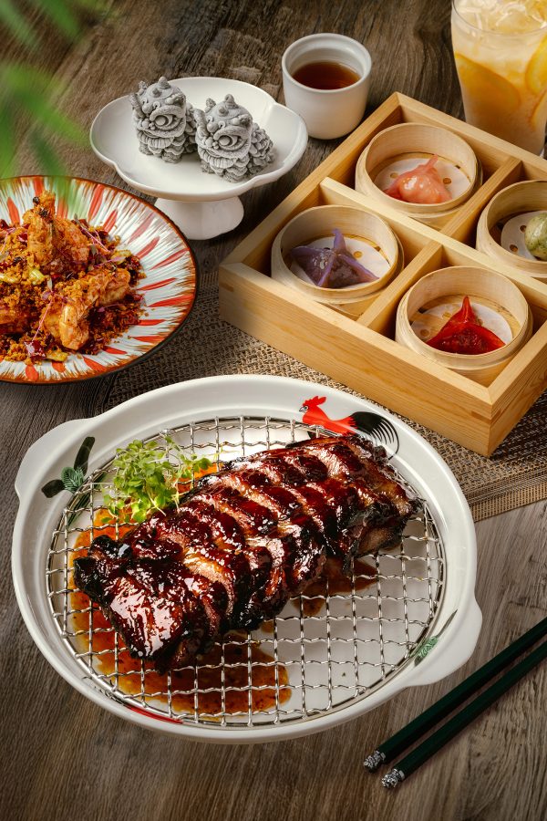 Various dishes including a slow-roasted barbecued Iberico pork in char siu sauce, served at Canton House, Hong Kong.
