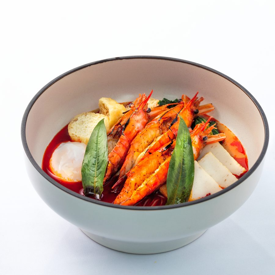 A closeup of a bowl of prawn laksa served at Voon, Hong Kong.