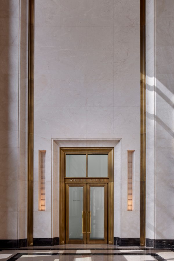 A doorway extends high into the ceiling at Eaton Hong Kong. 