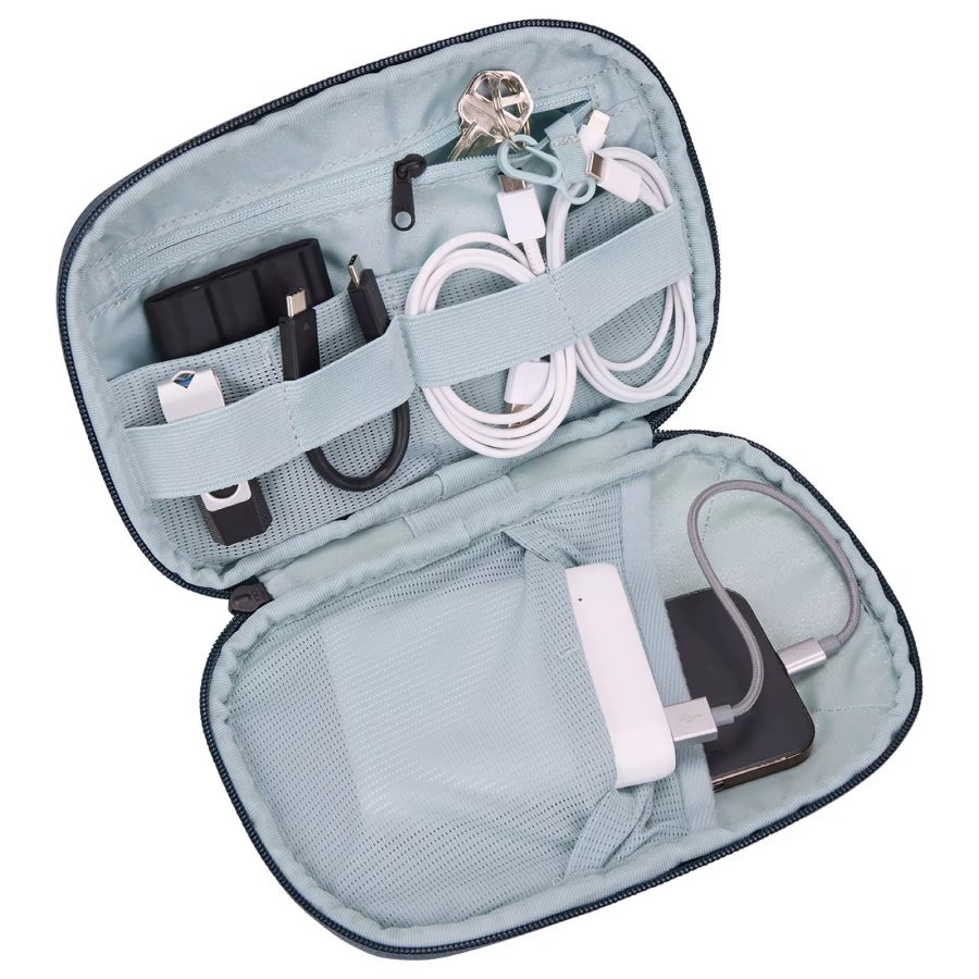 A product shot of Thule’s Electronic Organiser shows its interior holding different cables, portable chargers and a USB. 