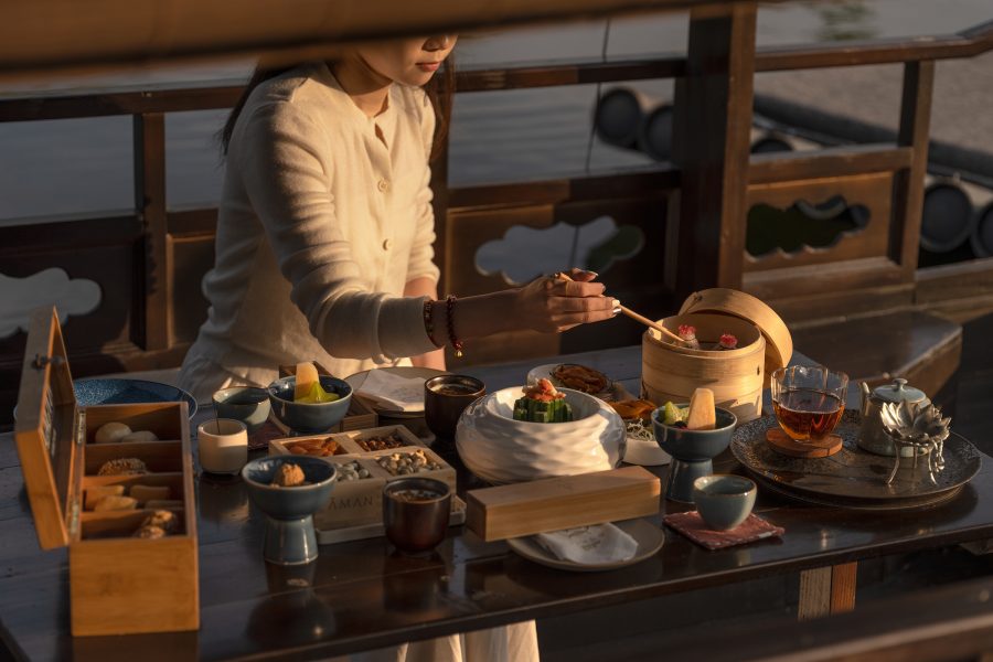 Woman preparing Chinese dishes at the Amanyangyun in the Chinese Mainland.
