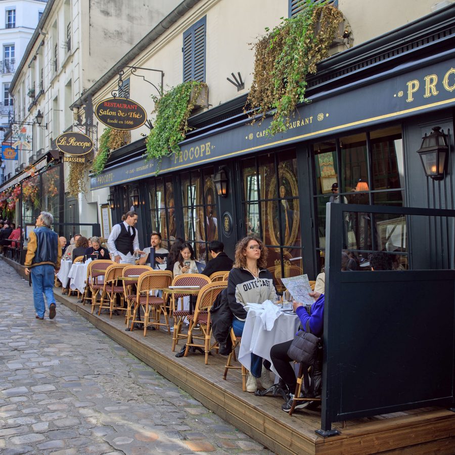 The streetside outdoor terrace of Parisian restaurant Le Procope  
