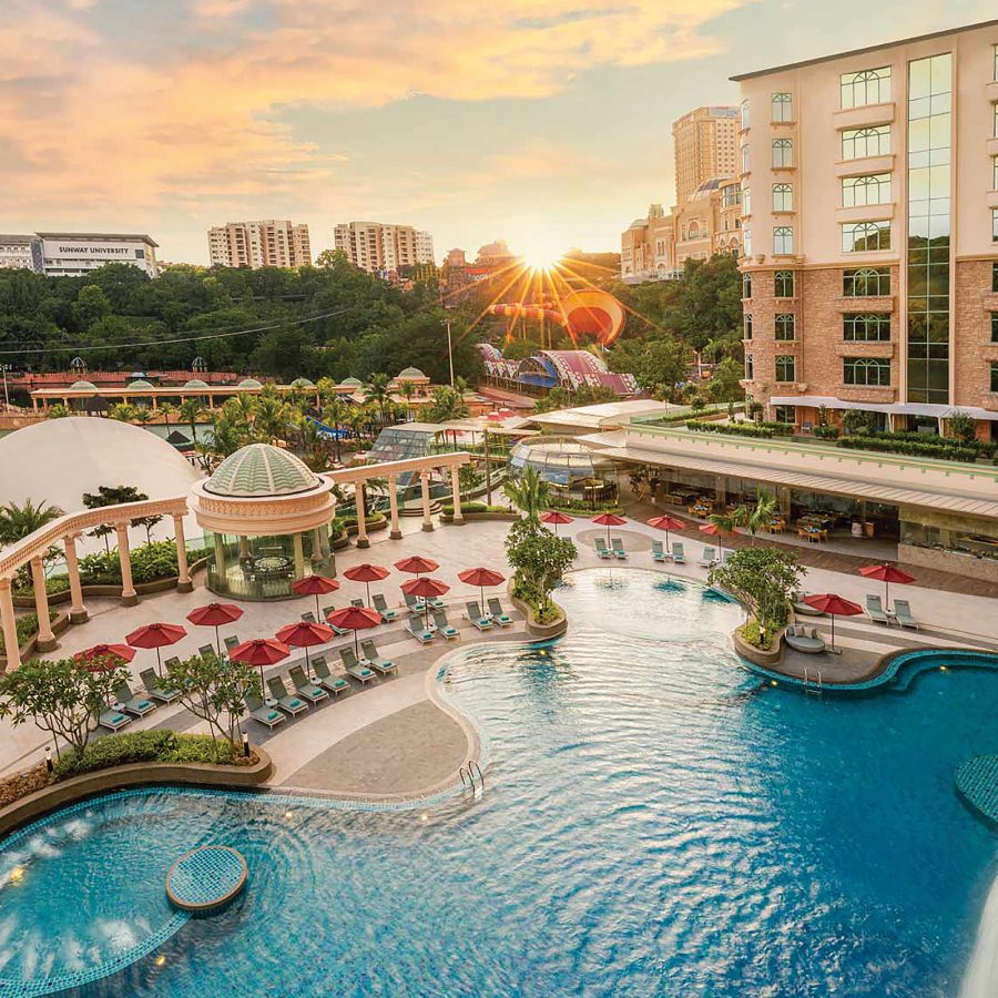 The Sunway Resort Hotel’s outdoor pool, with buildings in the background.