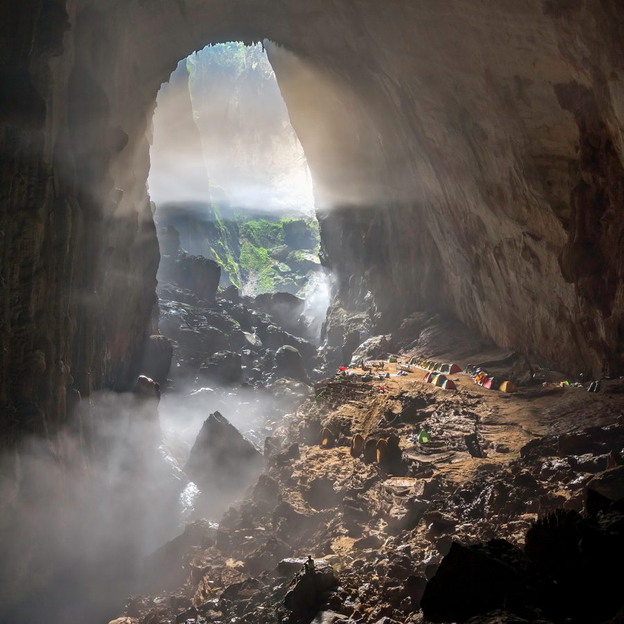 The entrance to a cave in Phong Nha-Ke Bang National Park provides light to the outer walls of the cavern.