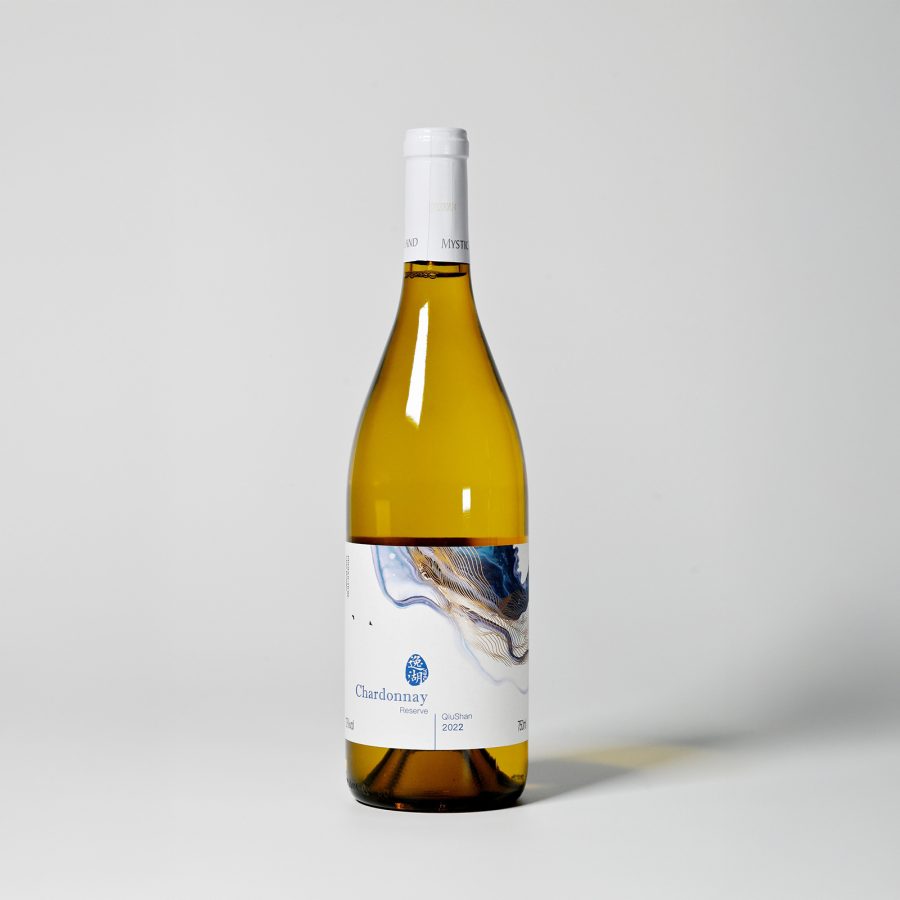A bottle of Yihu Chardonnay Reserve against a white backdrop.