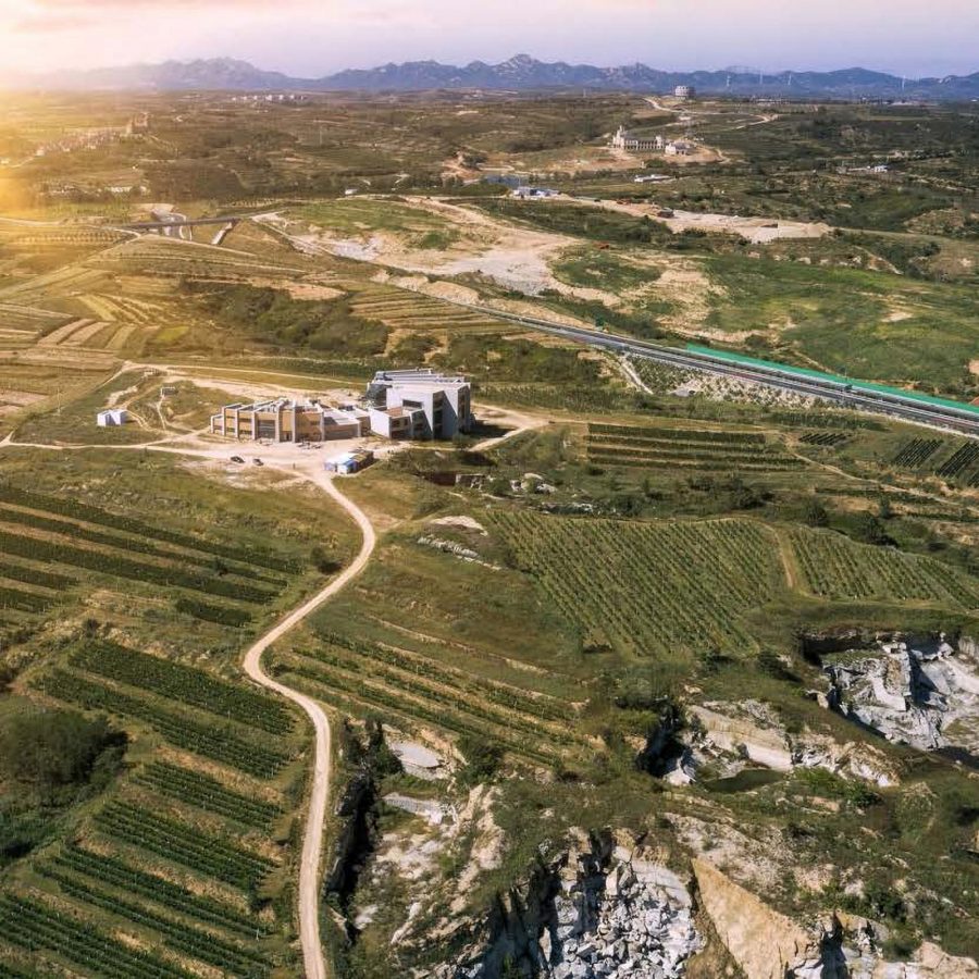 Aerial view of Chinese vineyard Mystic Island and buildings at the center of it. 