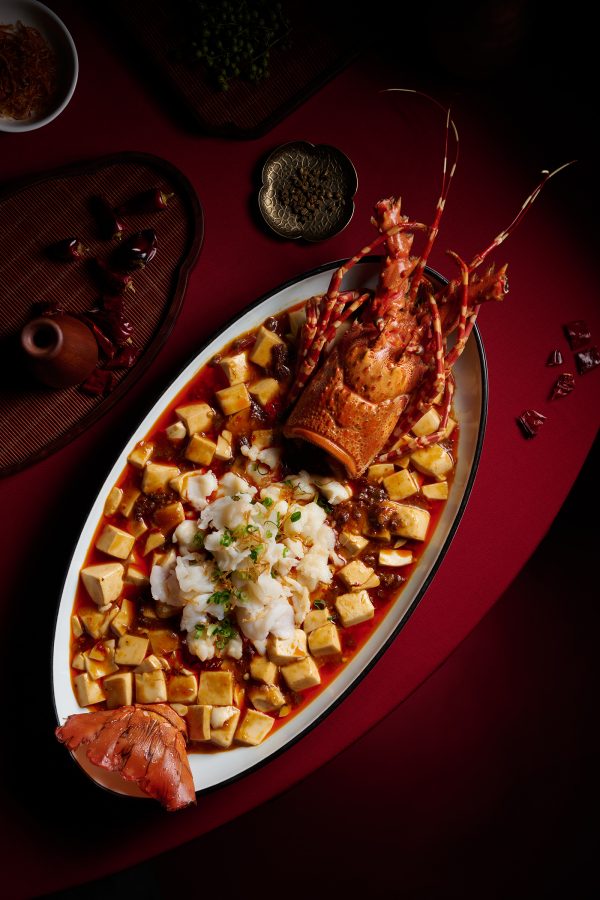 A lobster dish served on an oval plate at Sichuan Rouge