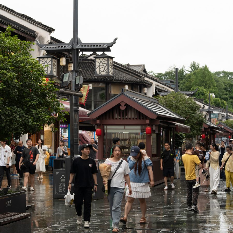 Exterior view of visitors walking down Hefang Street