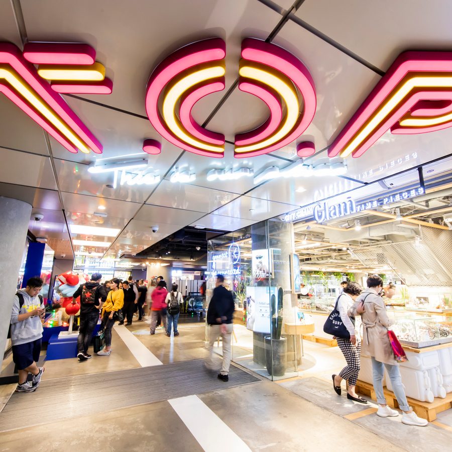 View of a gigantic T.O.P. sign on the ceiling of T.O.P. shopping mall in Mong Kok