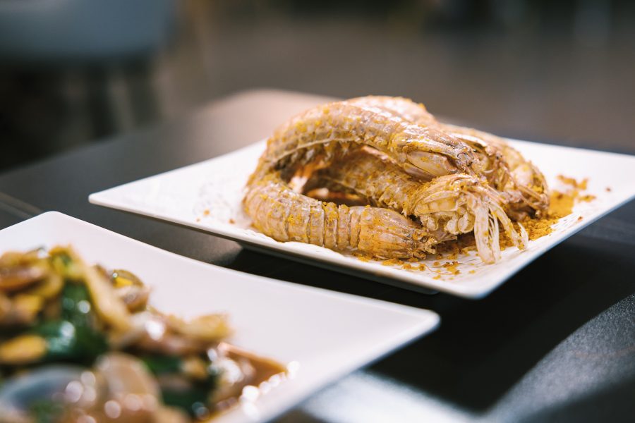 A closeup of a plate of fried mantis shrimp, served at Nanhai Fishing Boat on Haiqin Road, Yantian in Xiaomeisha, Shenzhen 