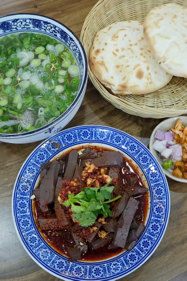 Sides served with a Xi’an-style lamb soup.